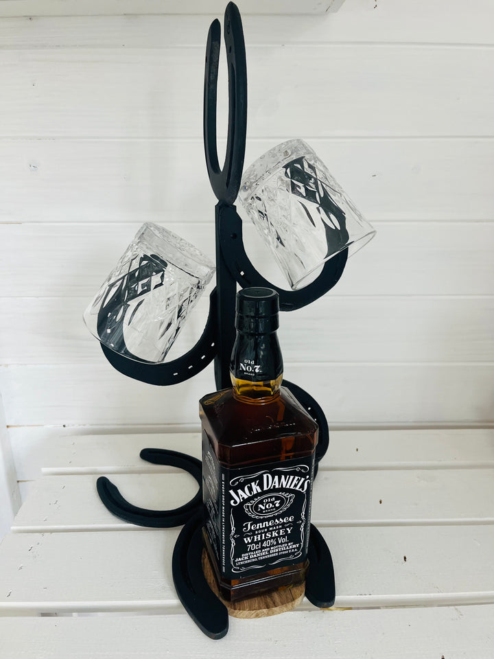 Unique whiskey stand made of horseshoes with a story